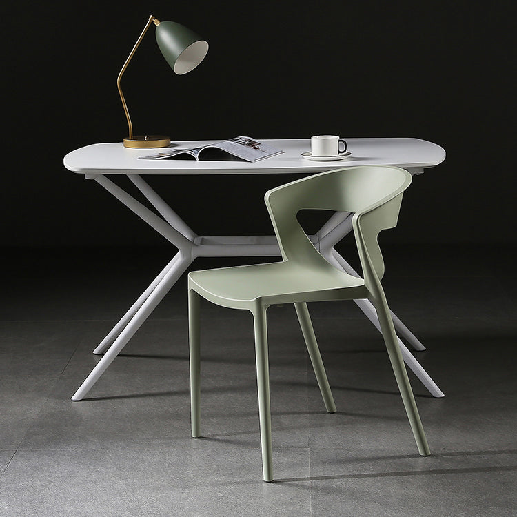 Silla lateral de comedor con respaldo abierto de estilo escandinavo, silla sin brazos de comedor de plástico para el hogar