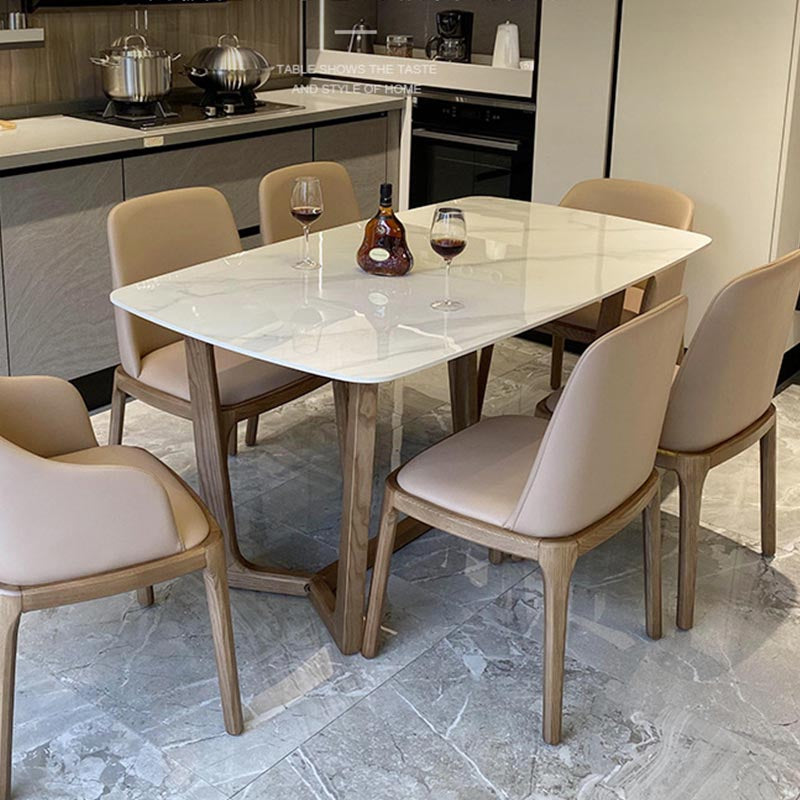 Mesa de comedor de piedra gris con mesa de comedor contemporánea con base de trineo