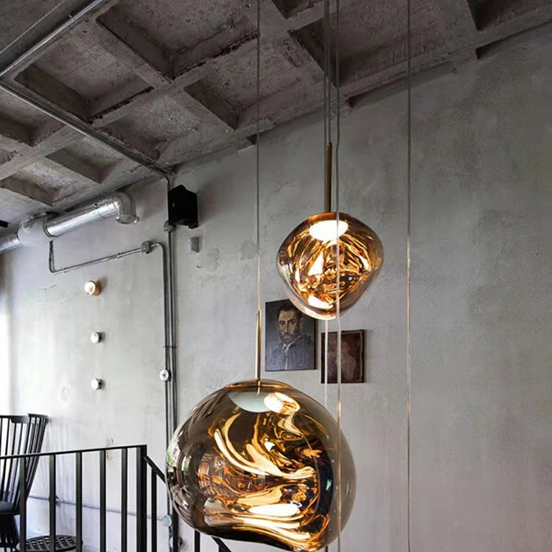 Aménagement d'éclairage pendentif en verre léger suspendu contemporain