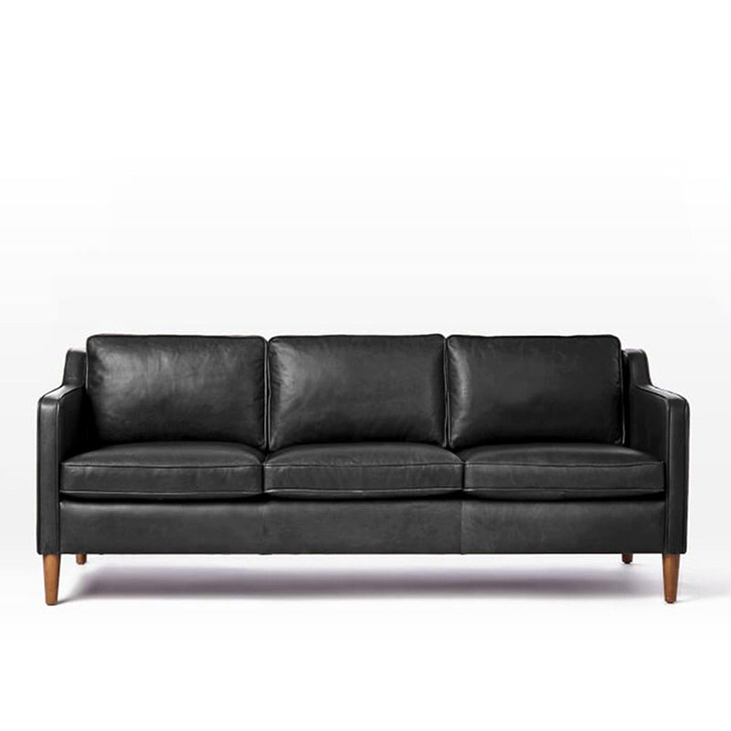 Industrial Faux Leather Loose Back Sofa with Solid Color Sloped Arms