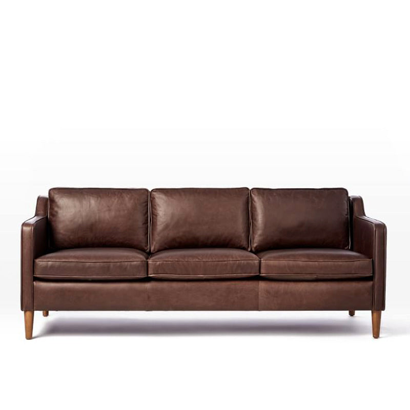Industrial Faux Leather Loose Back Sofa with Solid Color Sloped Arms