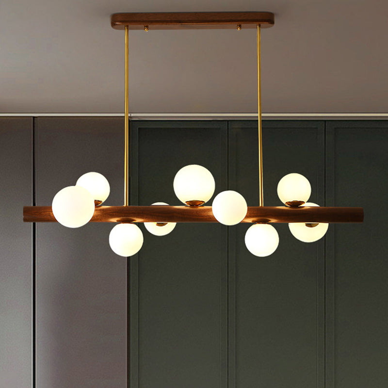 Luces colgantes de restaurantes de múltiples cabezas de madera moderna con sombra de vidrio de globo