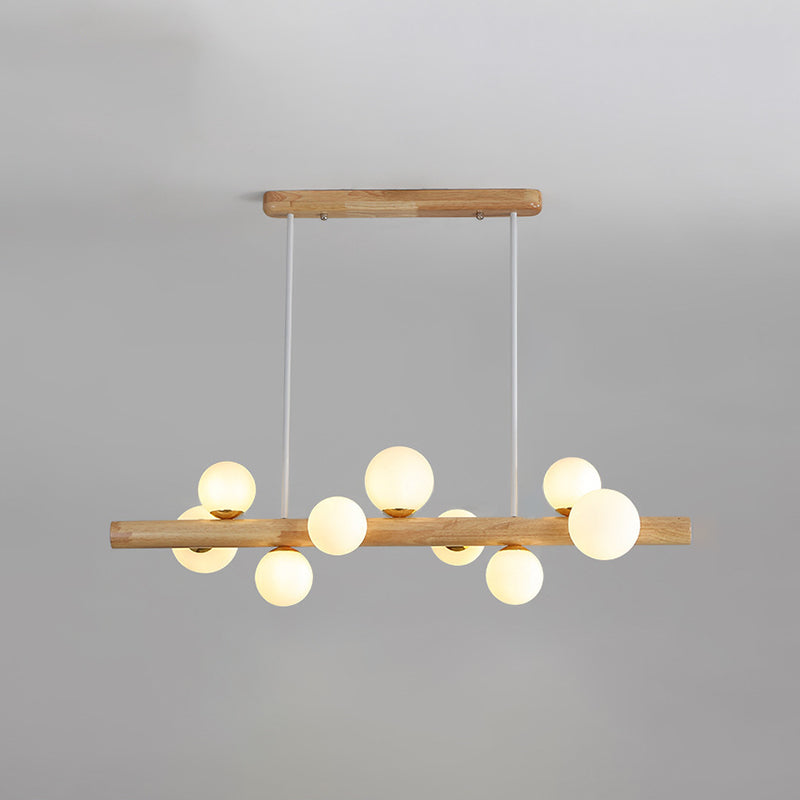 Luces colgantes de restaurantes de múltiples cabezas de madera moderna con sombra de vidrio de globo