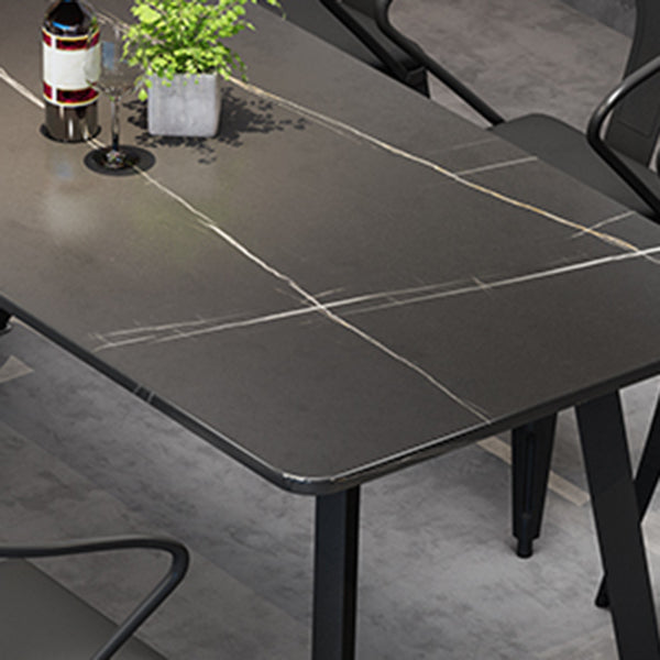Mesa de comedor de estilo industrial Mesa de comedor de piedra sinterizada negra con base de metal