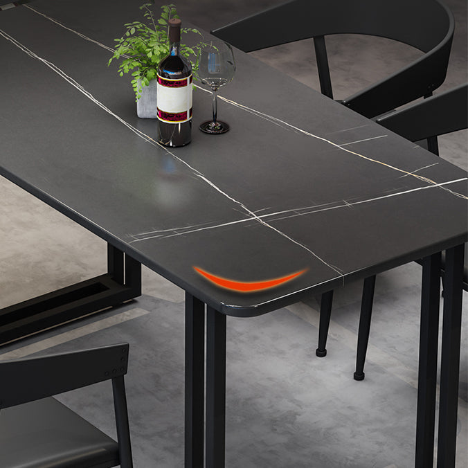 Mesa de comedor de estilo industrial Mesa de comedor de piedra sinterizada negra con base de metal