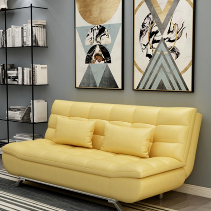 Armless 38"High Faux Leather Convertible Biscuit Back Sofa. Living Room