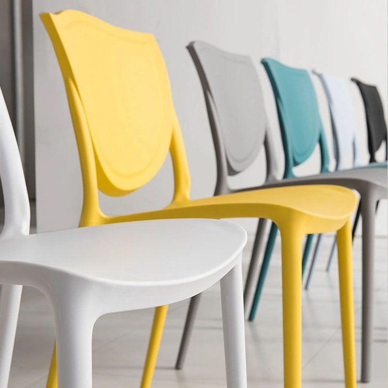 Scandinavische armloze open rugstoelen plastic eetkamerstoelen voor thuisgebruik