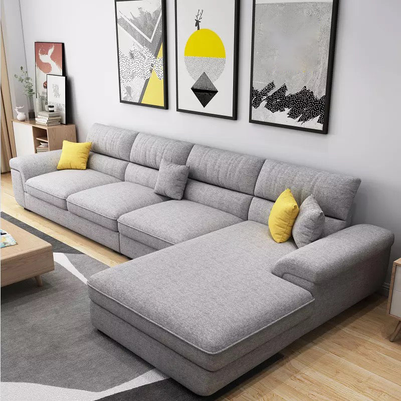 Contemporary L-Shape Sectional with Pillowed Back Cushions for Four People