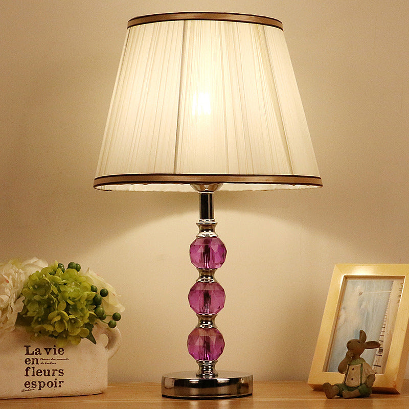 1 hoofd flare tafellamp eigentijds stoffen bureau licht in wit met paarse kristallen bal
