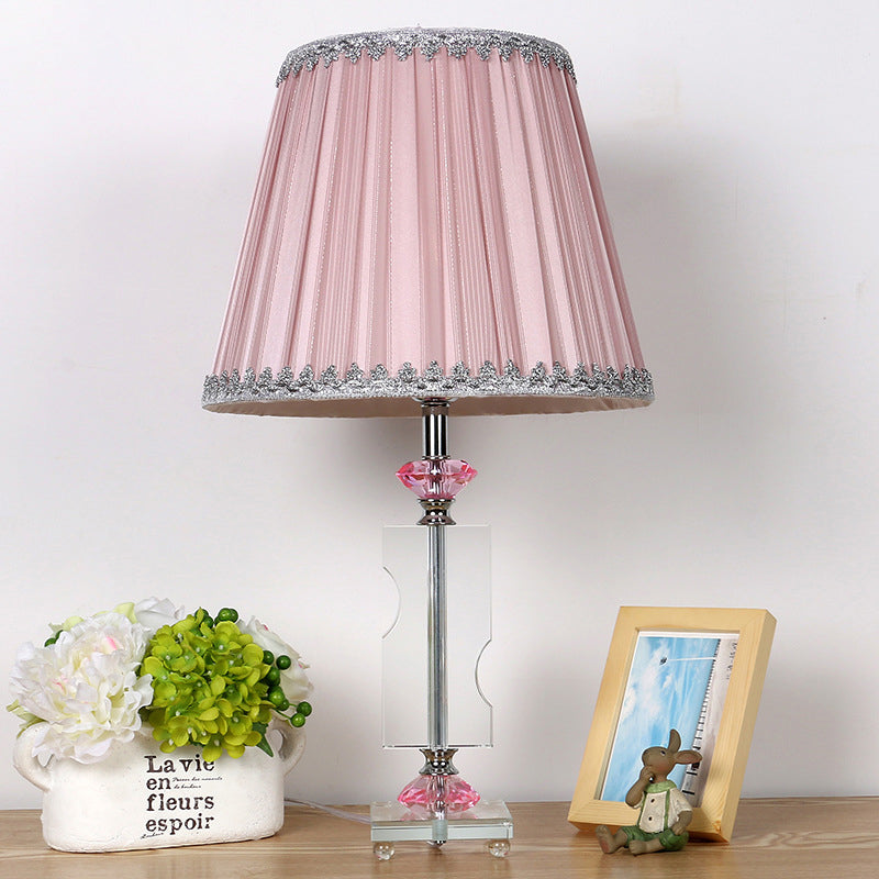 1 tête de salon de bureau modernisme modernisme table rose clair avec une teinte en tissu plissé