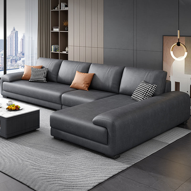 133.9"W √ó 70.87"D √ó35.43"H Faux Leather Pillow Top Arm Sectional with Stain-Resistant