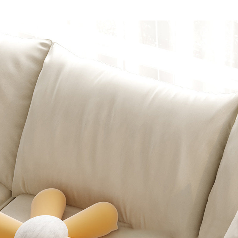 Beige Pillow Back Sectional with Flared Arm for Apartment and Living Room