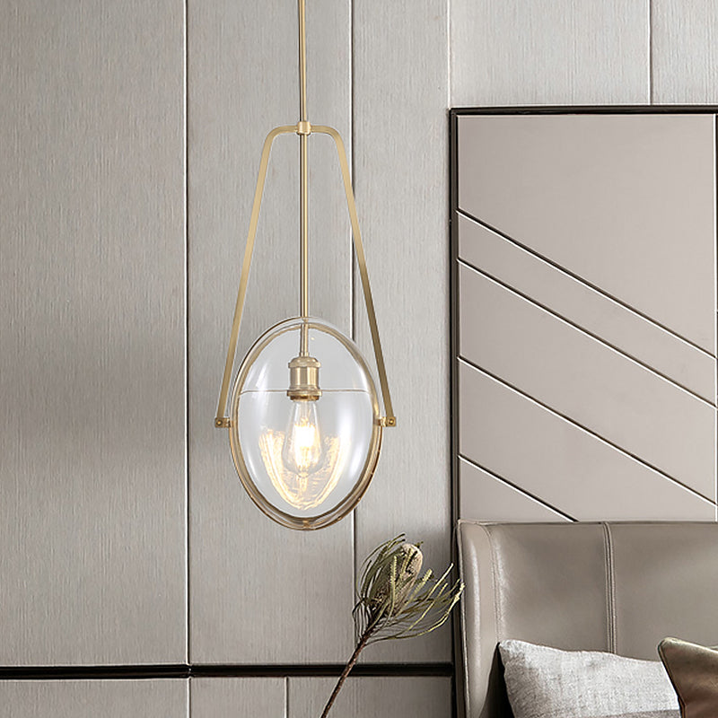 Brass Oval Pendant Light Contemporary 1-Light Clear Glass Ceiling Lamp with Forked Halberd Frame