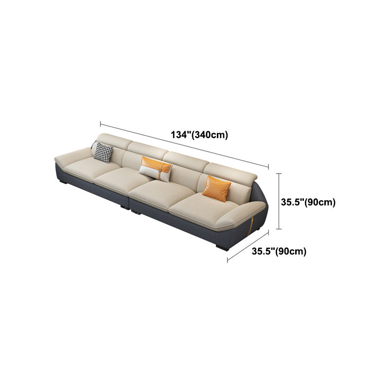 Nordic Faux Leather Sectional in Beige Flared Arm Sectional with Pillows