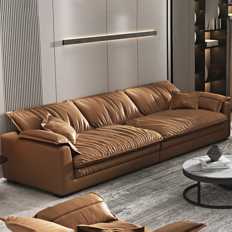 Glam Style Sofa Bed with Sponge Upholstery Filled Orange Faux Leather Sofa