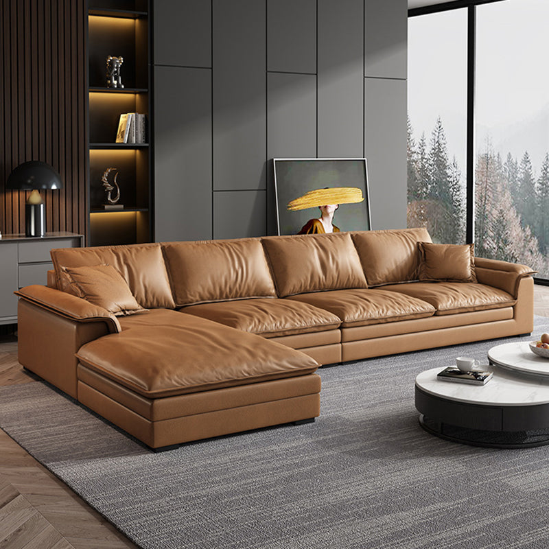 Glam Style Sofa Bed with Sponge Upholstery Filled Orange Faux Leather Sofa