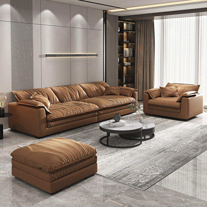 Glam Style Sofa Bed with Sponge Upholstery Filled Orange Faux Leather Sofa