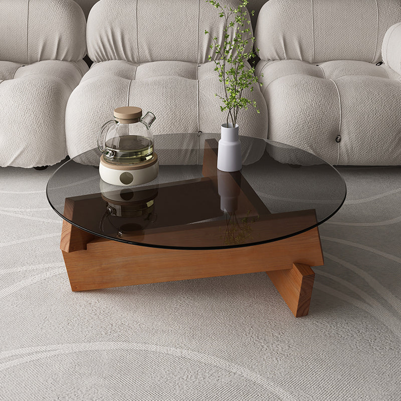 Modern Round Glass Top Coffee Table with Abstract Wooden Leg
