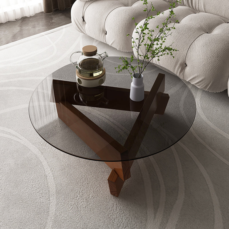 Modern Round Glass Top Coffee Table with Abstract Wooden Leg