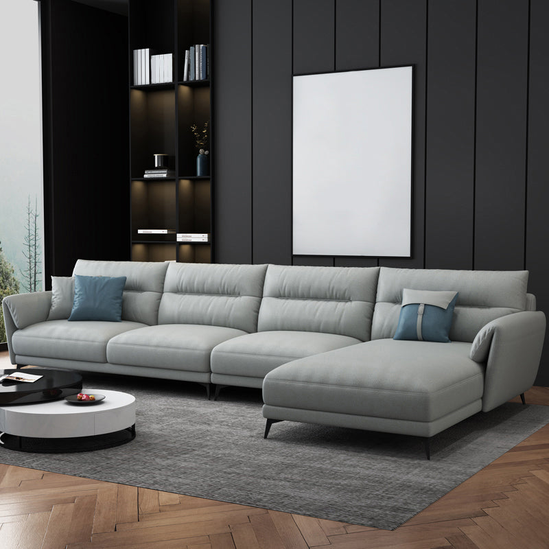 Contemporary 4-Seater Sectional with Pillow Top Arms in Faux Leather