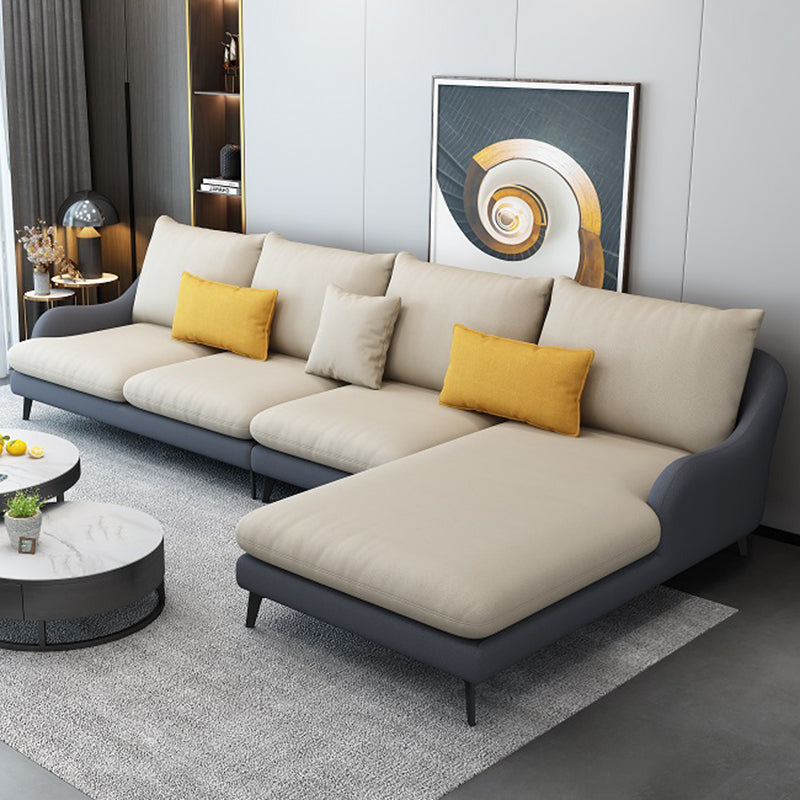 4-Seater L-Shape Sectional with Pillows Back and Slopped Arms