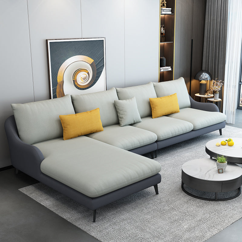 4-Seater L-Shape Sectional with Pillows Back and Slopped Arms