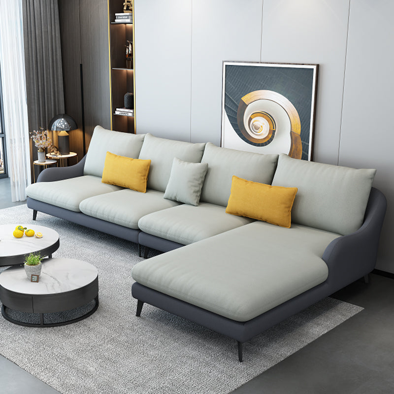 4-Seater L-Shape Sectional with Pillows Back and Slopped Arms