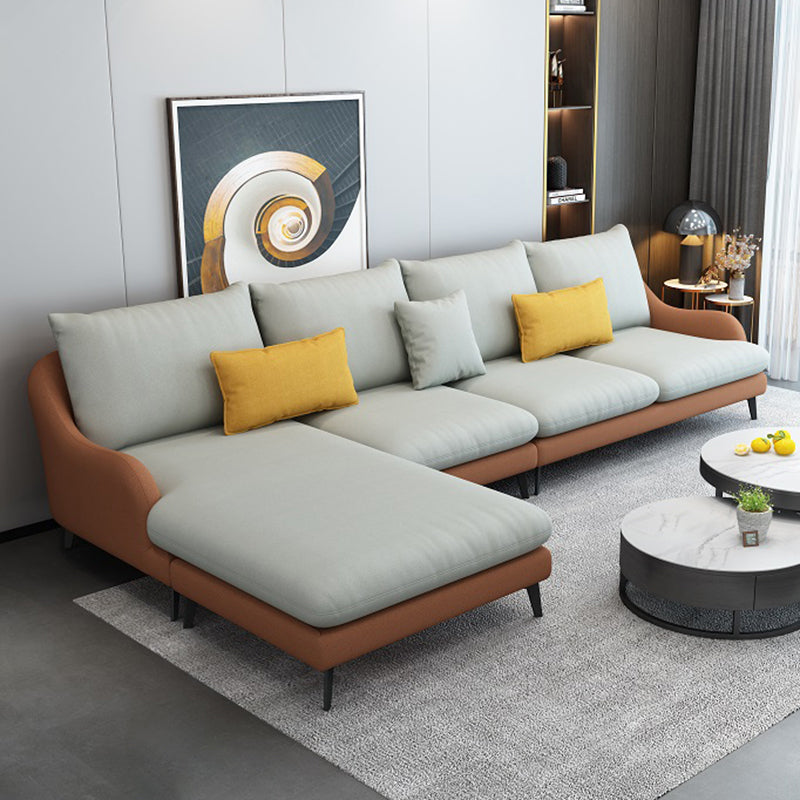 4-Seater L-Shape Sectional with Pillows Back and Slopped Arms