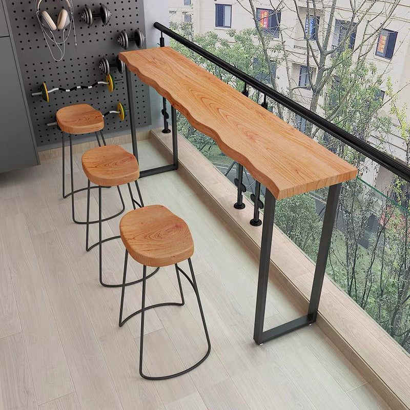 Industrial Specialty Bar Table Brown Solid Wood Bar Height Cocktail Table with Sled Base