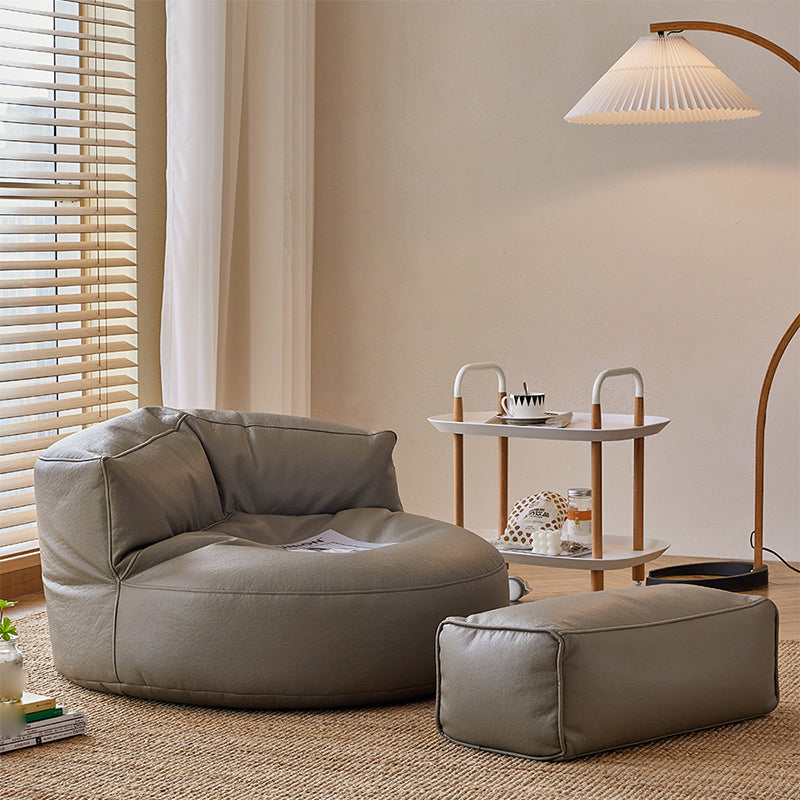 Contemporary Bonded Leather Armless Reclining Tight Back Lounge Chair