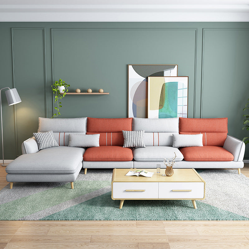 Fabric Pillow Back Sectional Flared Arm Sectional with Wood Accents