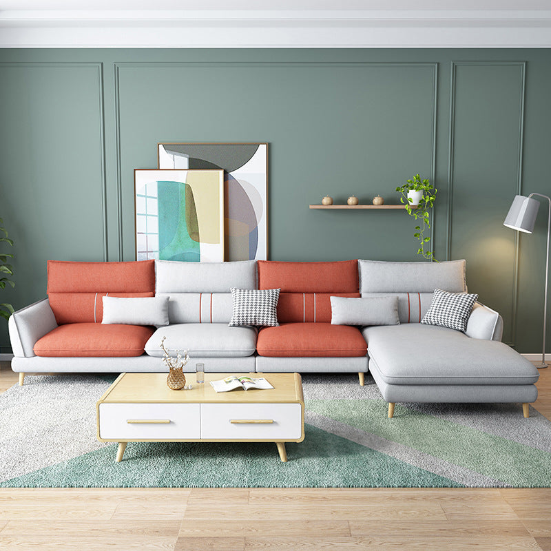 Fabric Pillow Back Sectional Flared Arm Sectional with Wood Accents