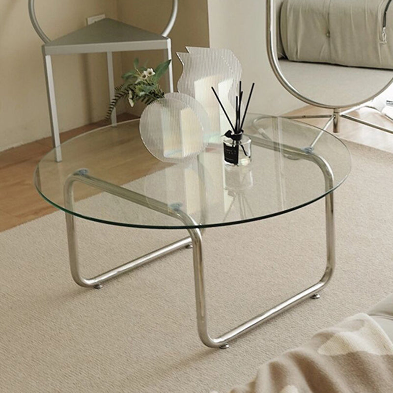 Contemporary Round Glass Top Cocktail Table with Sled Steel Base