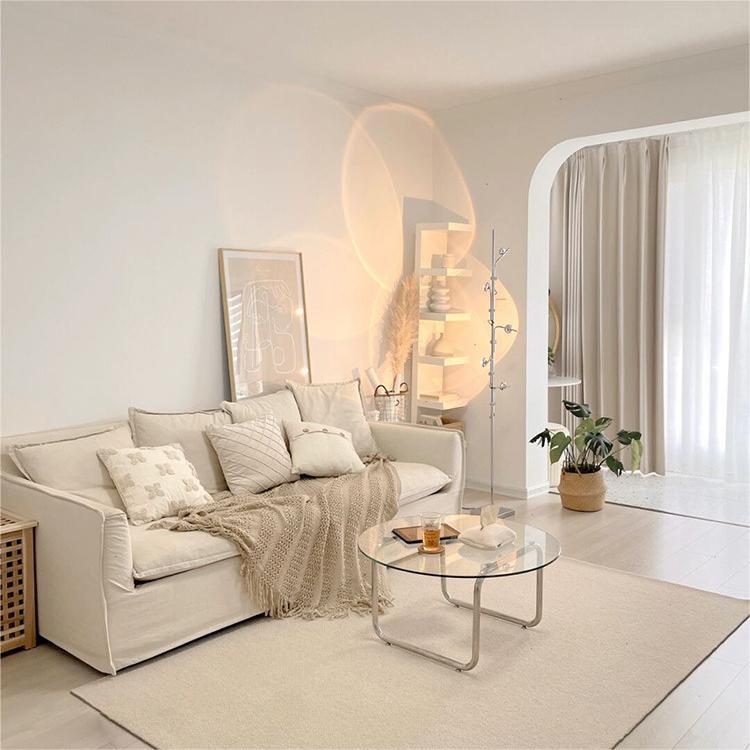 Contemporary Round Glass Top Cocktail Table with Sled Steel Base