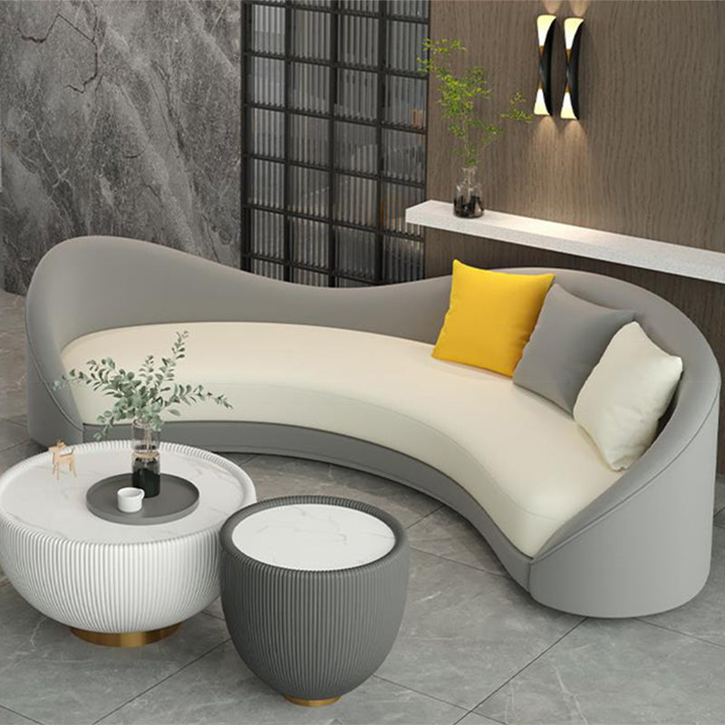 Contemporary Sloped Arm Curved Sofa Faux Leather Camel Back Sofa