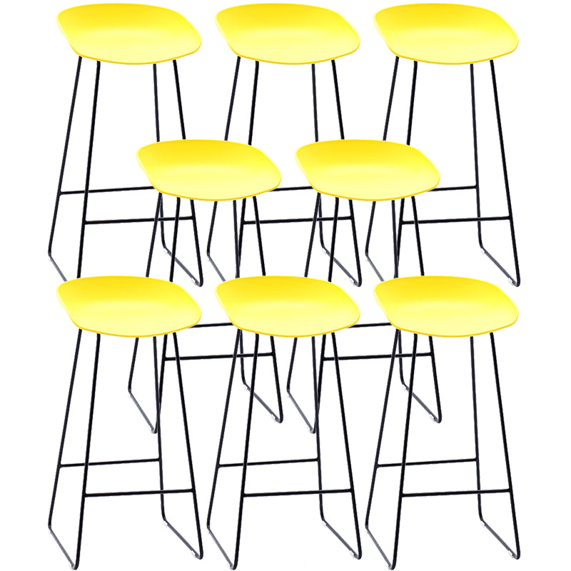 Contemporary Plastic Armless Bar Stool Low Back Bar Height Stool with Metal Frame