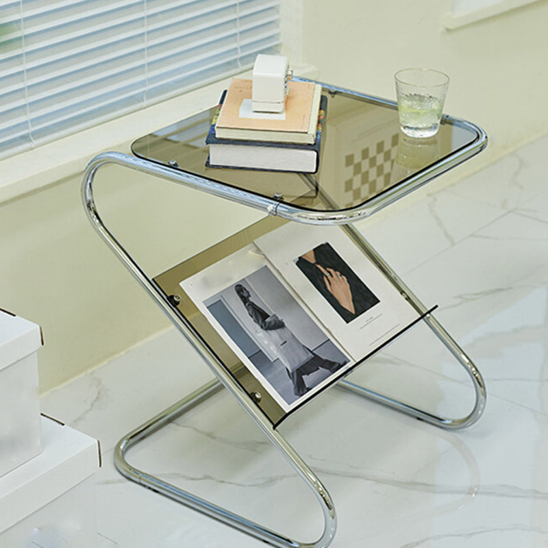 Modern Glass Top Side Table Metal Abstract Base End Table with Magazine Holder