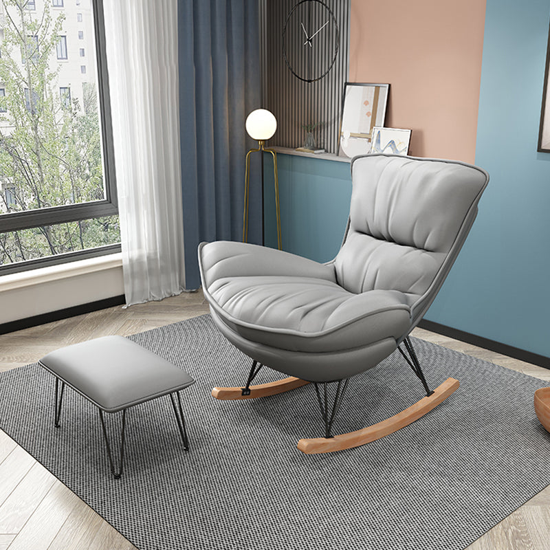 Contemporary Rocker Upholstered Tufted Cushions with Dark legs Glider