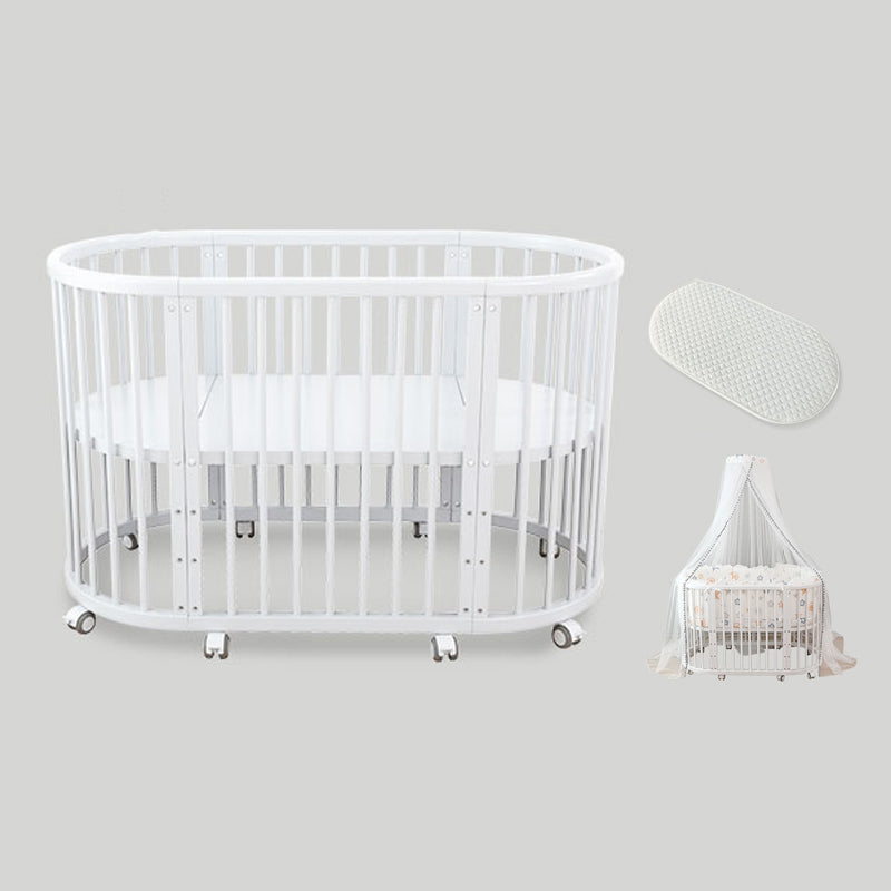 Oval Solid Wood Crib Nordic Style 5-In-1 Convertible Crib with Casters