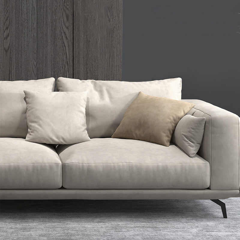 Contemporary Faux Leather Pillows Back Sofa with Tuxedo Arm in Beige