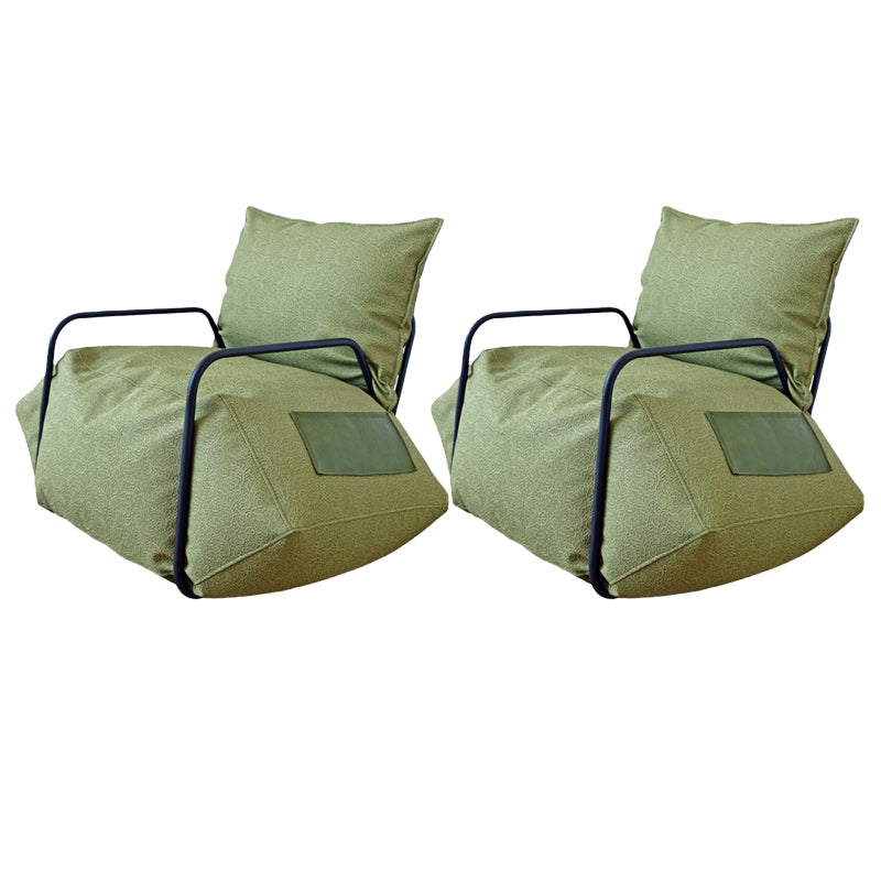 Contemporary Armchair Pillow Back Round Arms with Black Legs Leather Arm Chair