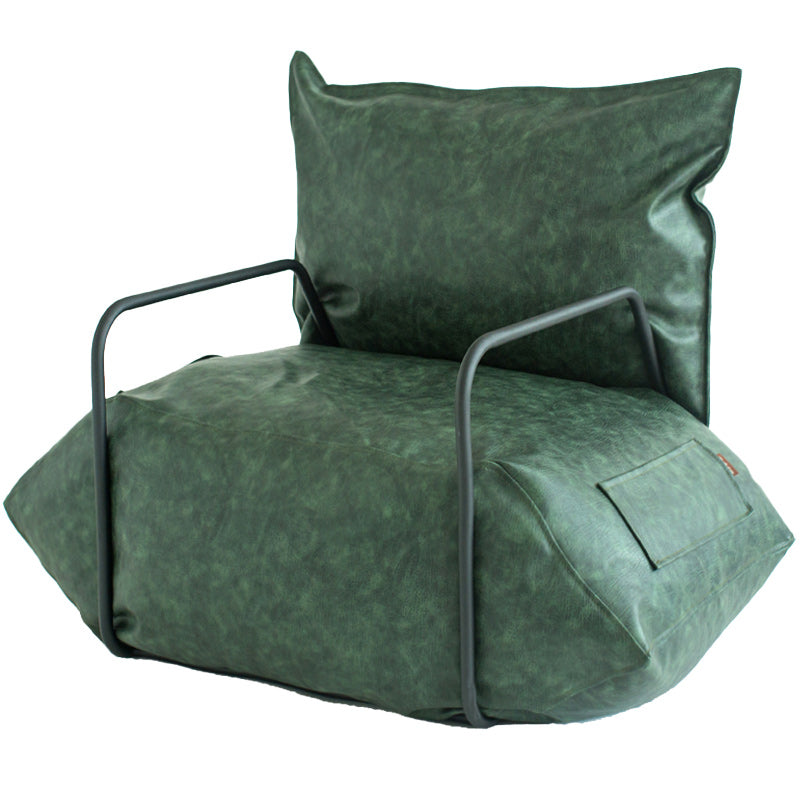 Contemporary Armchair Pillow Back Round Arms with Black Legs Leather Arm Chair