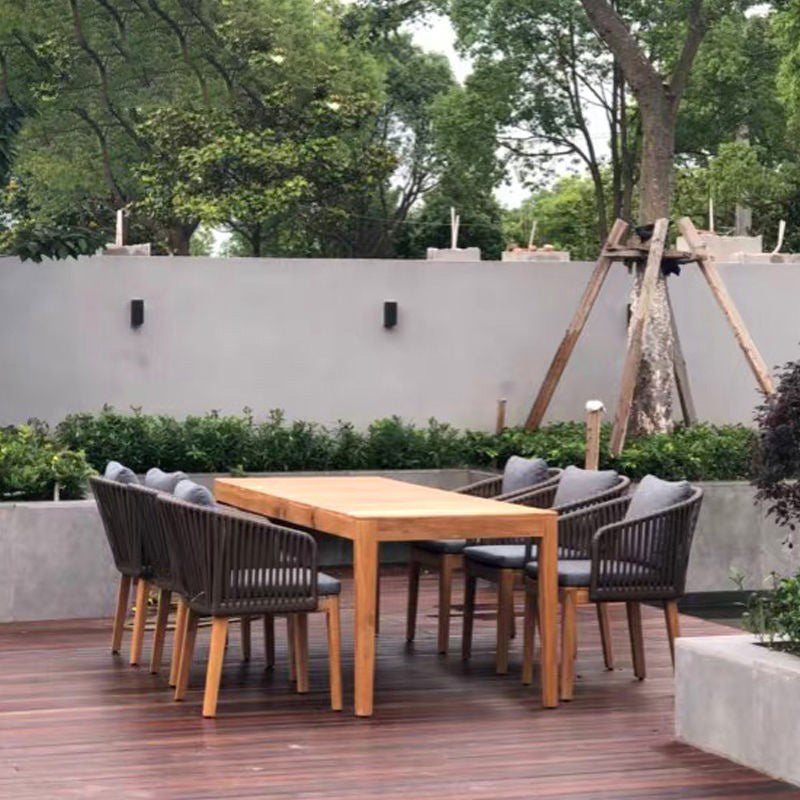 Tropical Patio Dining Armchair in Brown with Natural Wooden Base