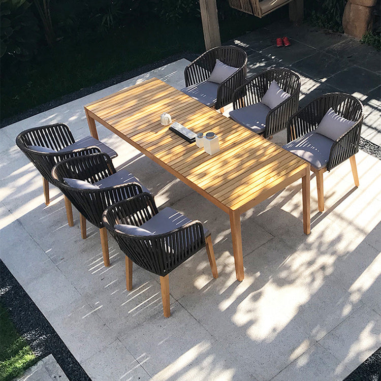 Tropical Patio Dining Armchair in Brown with Natural Wooden Base