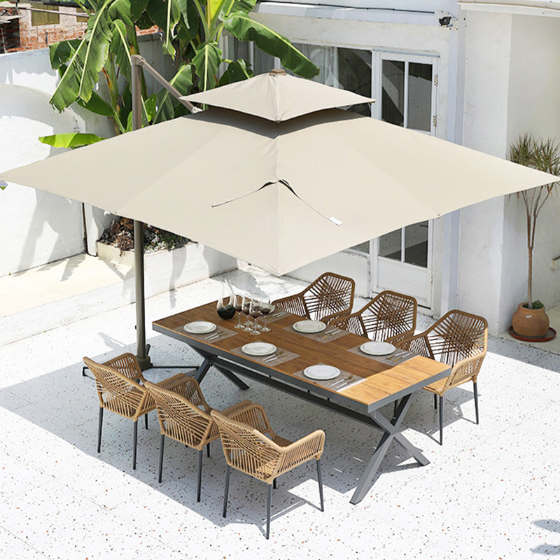 Tropical Outdoor Bistro Stacking Chairs with Arms in Faux Rattan