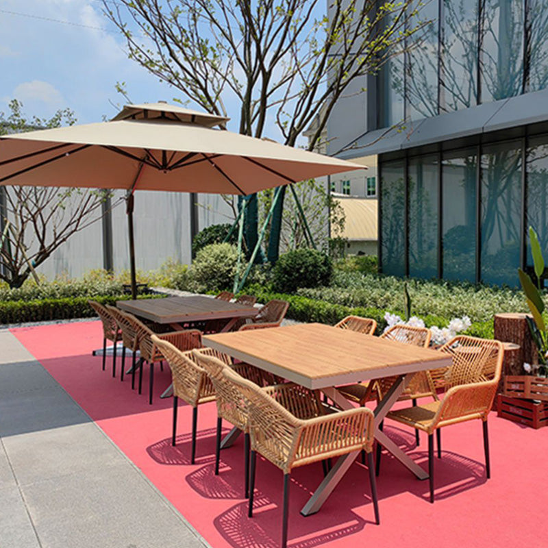 Tropical Outdoor Bistro Stacking Chairs with Arms in Faux Rattan