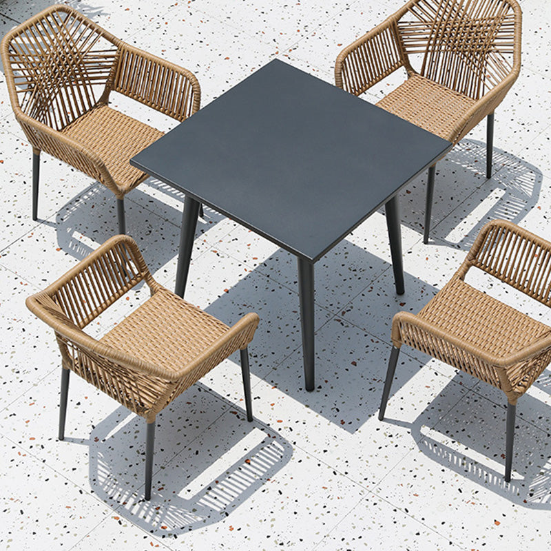 Tropical Outdoor Bistro Stacking Chairs with Arms in Faux Rattan