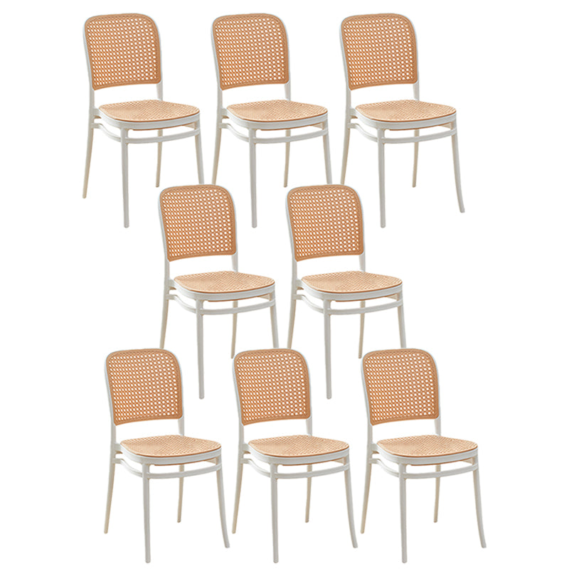 Tropical Plastic Armles Chairs Stacking Outdoors Dining Chairs