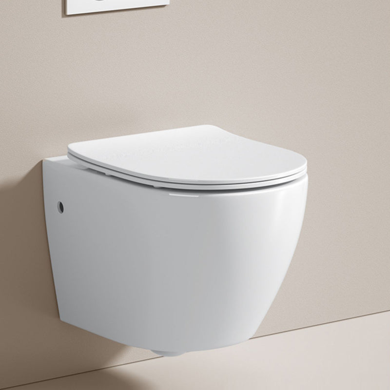 Modern Ceramic Flush Toilet Wall Hung Urine Toilet with Slow Close Seat for Washroom