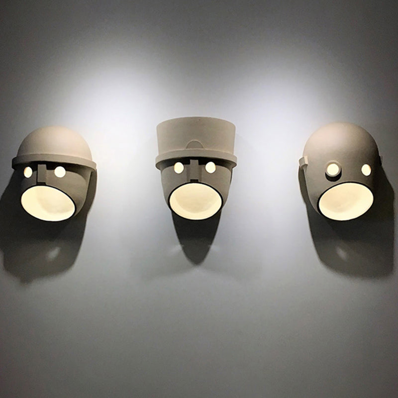 Modern Metal Wall Sconce Mask Shape Wall Light with Resin Shade for Living Room